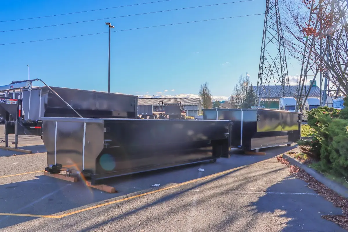 Roll-off dumpster ready for waste disposal at job site for 2 Yard Dumpster Rental in Meredith
